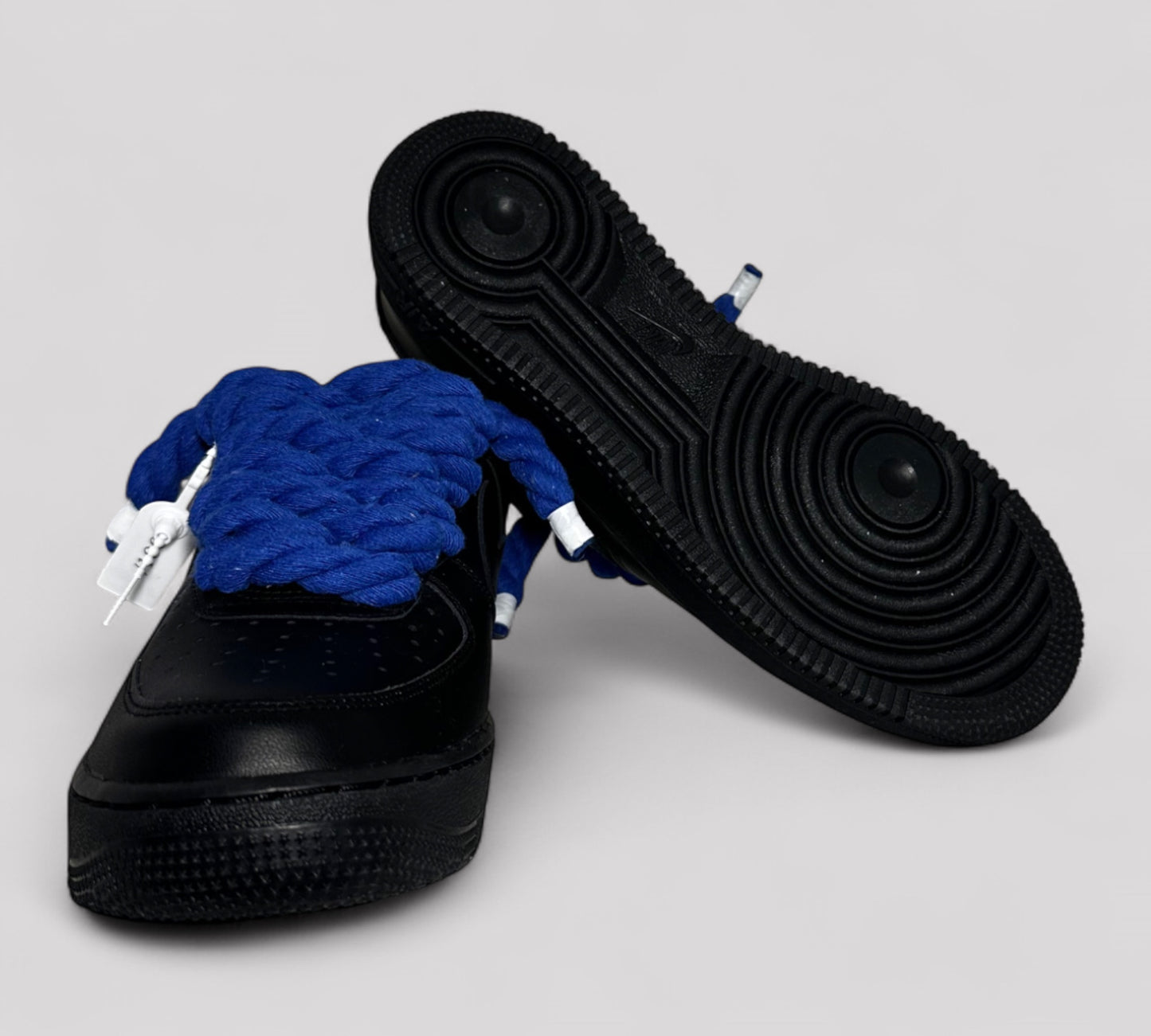 Sole detail of Black Nike AF1 with rope laces