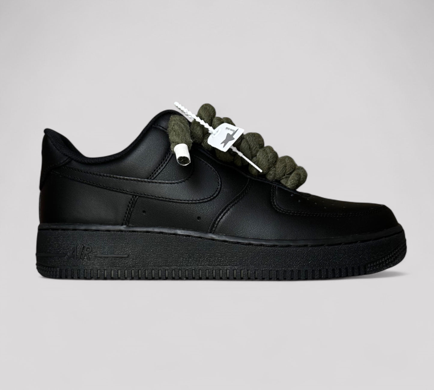 Black Nike air force 1 with kahki rope laces