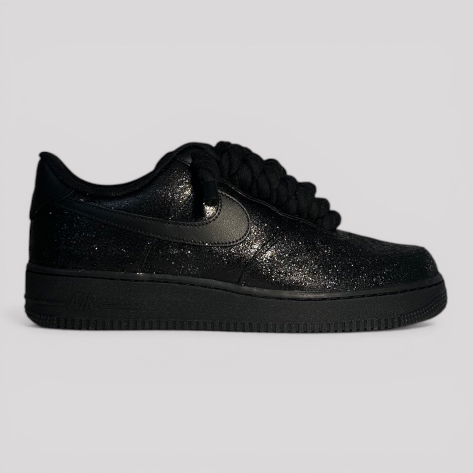 Custom black Nike Air Force 1 black rope laces side view single shoe