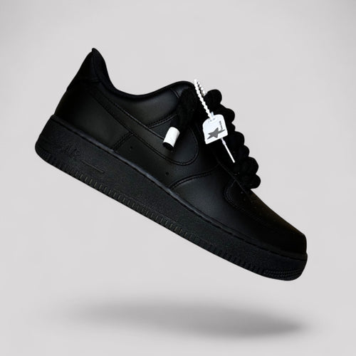 Custom black Nike Air Force 1 black rope laces floating side view single shoe