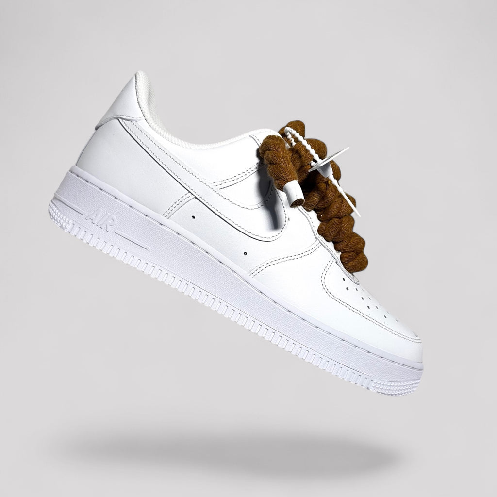 Custom white Nike Air Force 1 brown rope laces floating side view single shoe