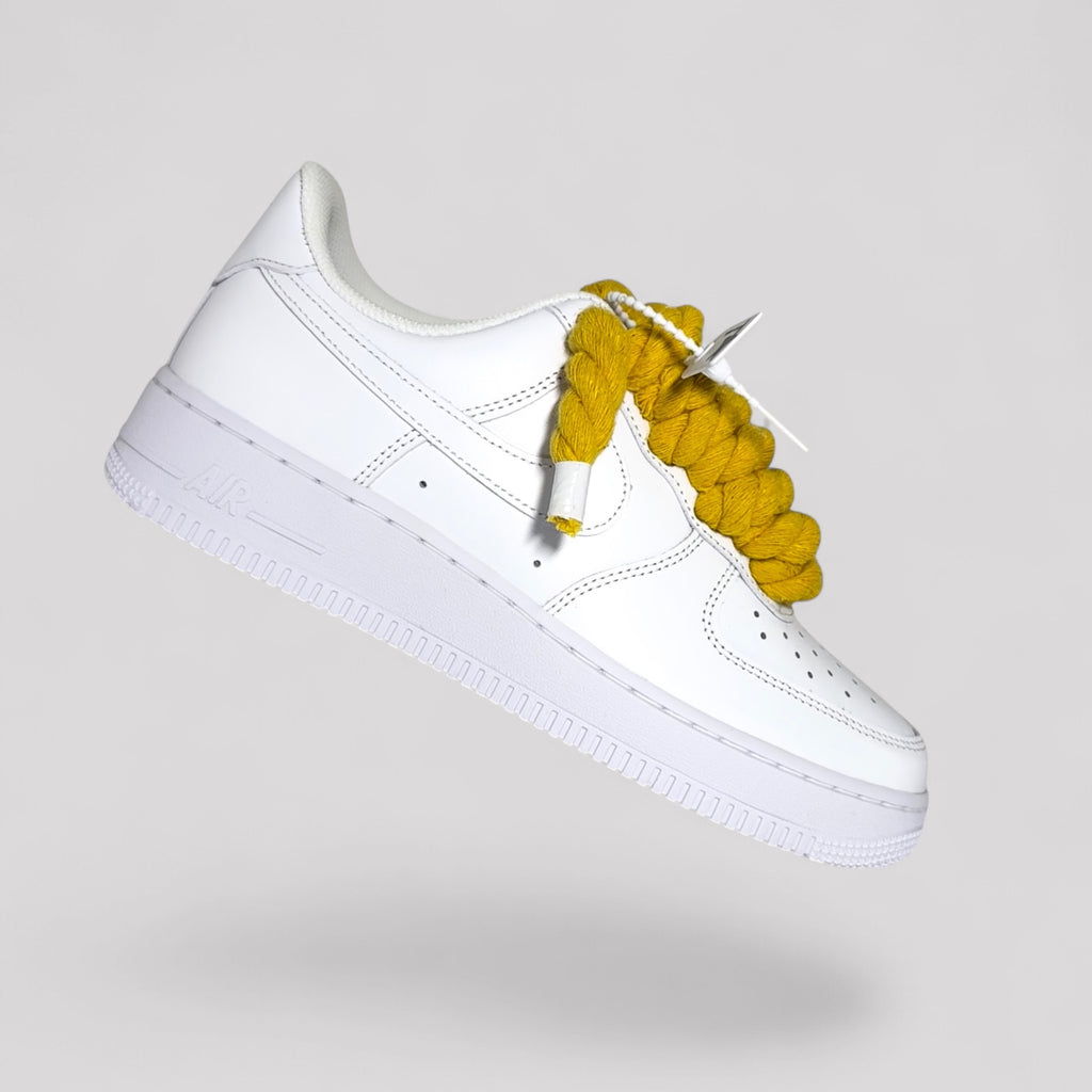 Custom white Nike Air Force 1 yellow rope laces side view floating