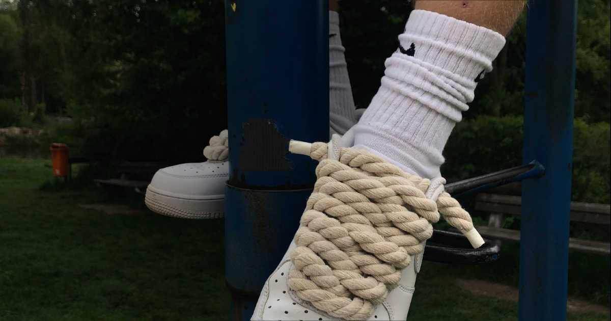 Nike air force 1 rope laces siting onReferee's seat