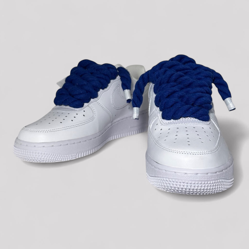 Custom white Nike Air Force 1 navy blue rope laces angled side view pair