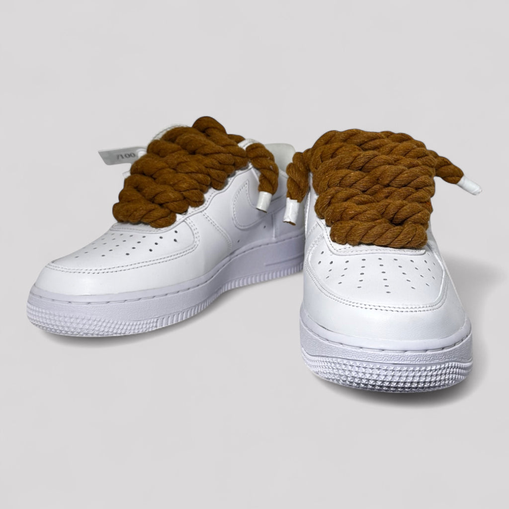 Custom white Nike Air Force 1 brown rope laces angled side view pair